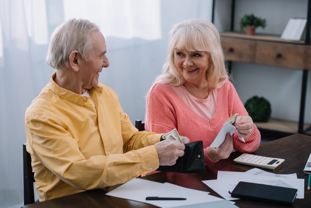 senior couple checking finances
